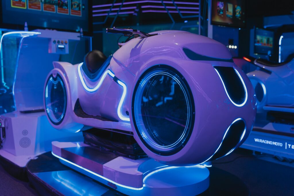 Explore the futuristic virtual reality motorcycle simulator with neon lights, perfect for uninterrupted entertainment.